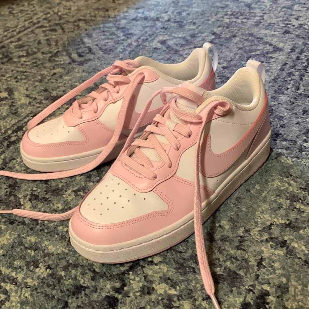 BRAND NEW kids nike sneakers fit women size 7!!